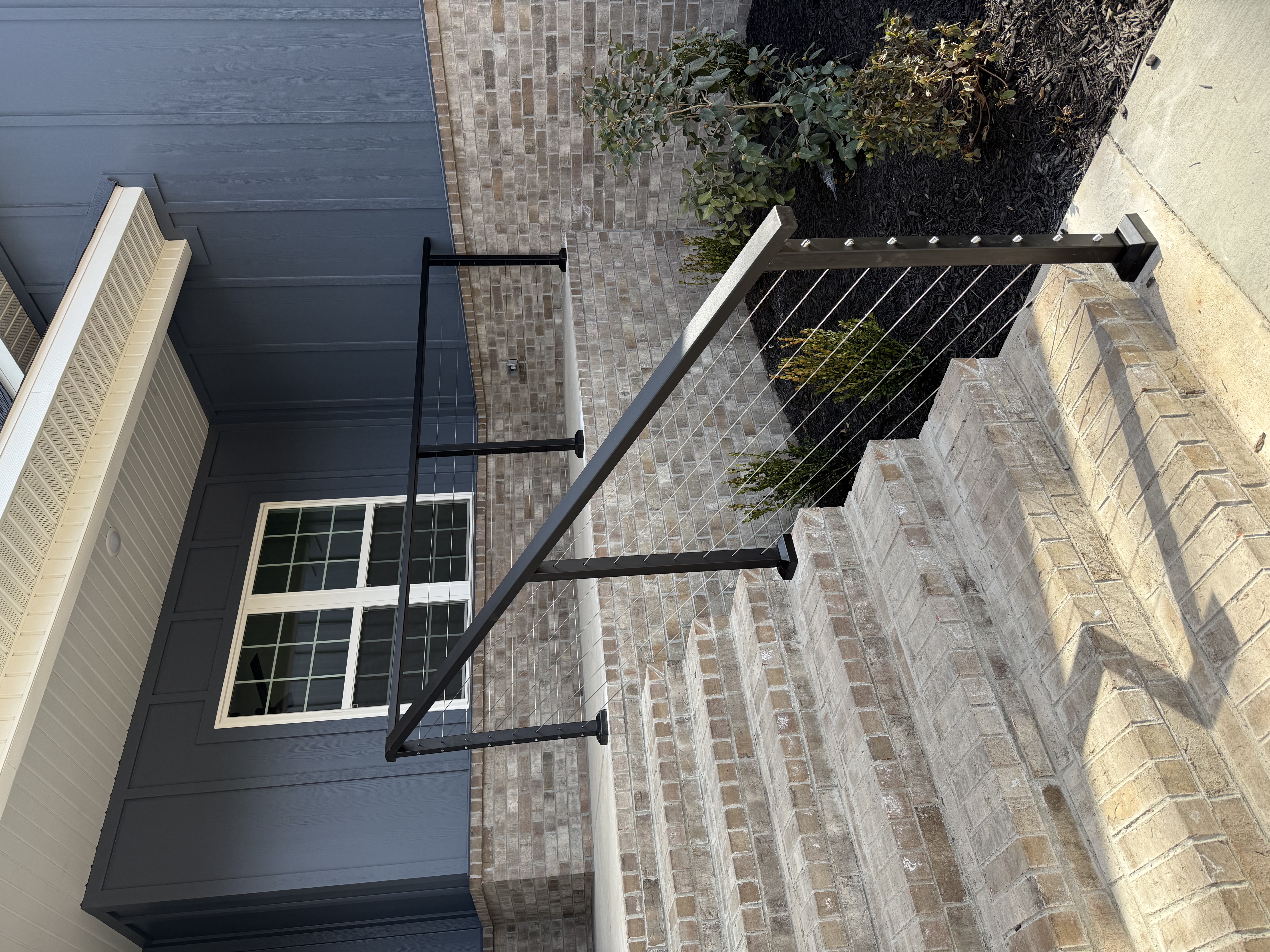 Cable railing on residential stairs